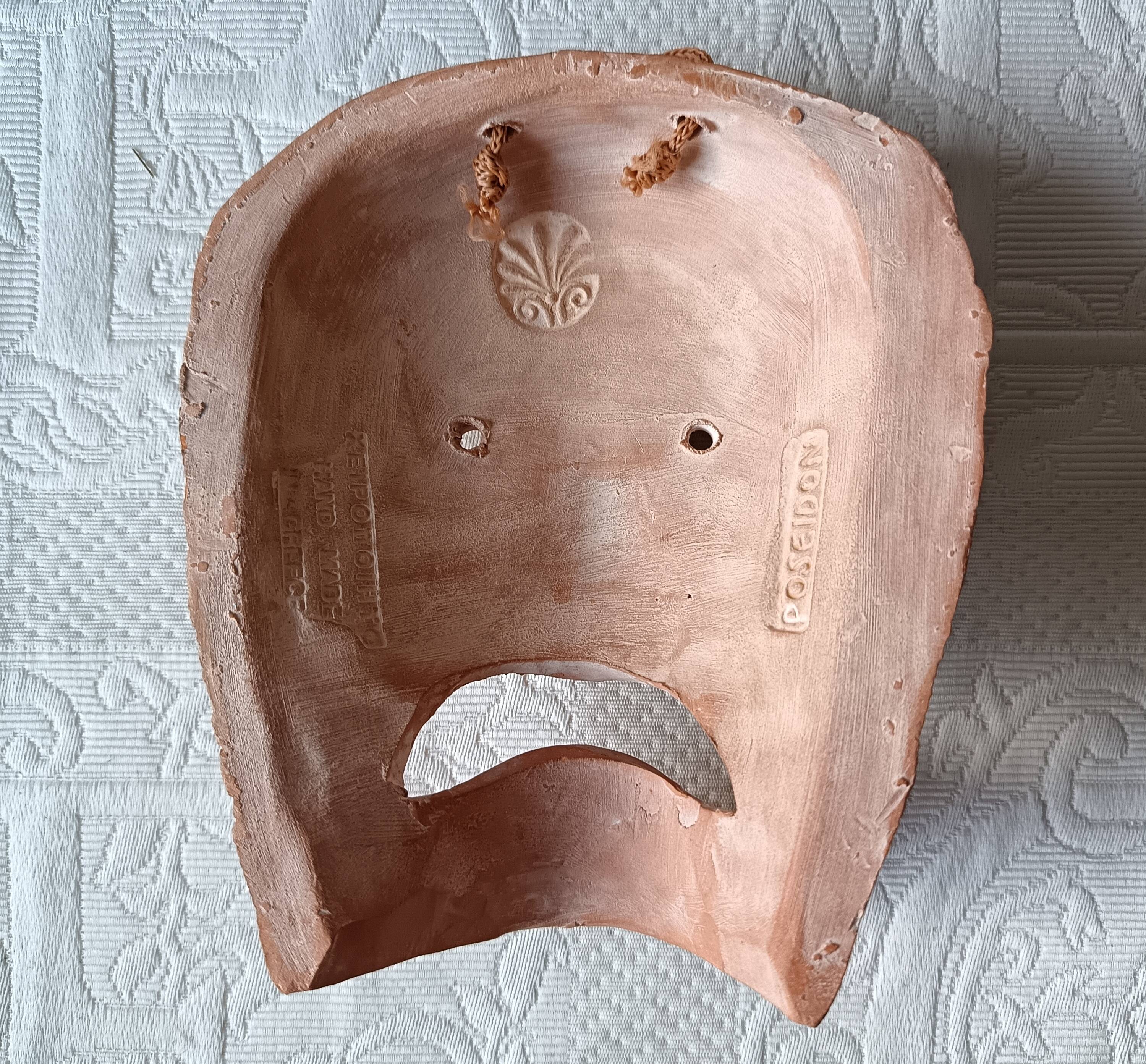 2 vintage terracotta masks made in Greece