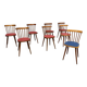 Huit chaises Baumann à assise colorée