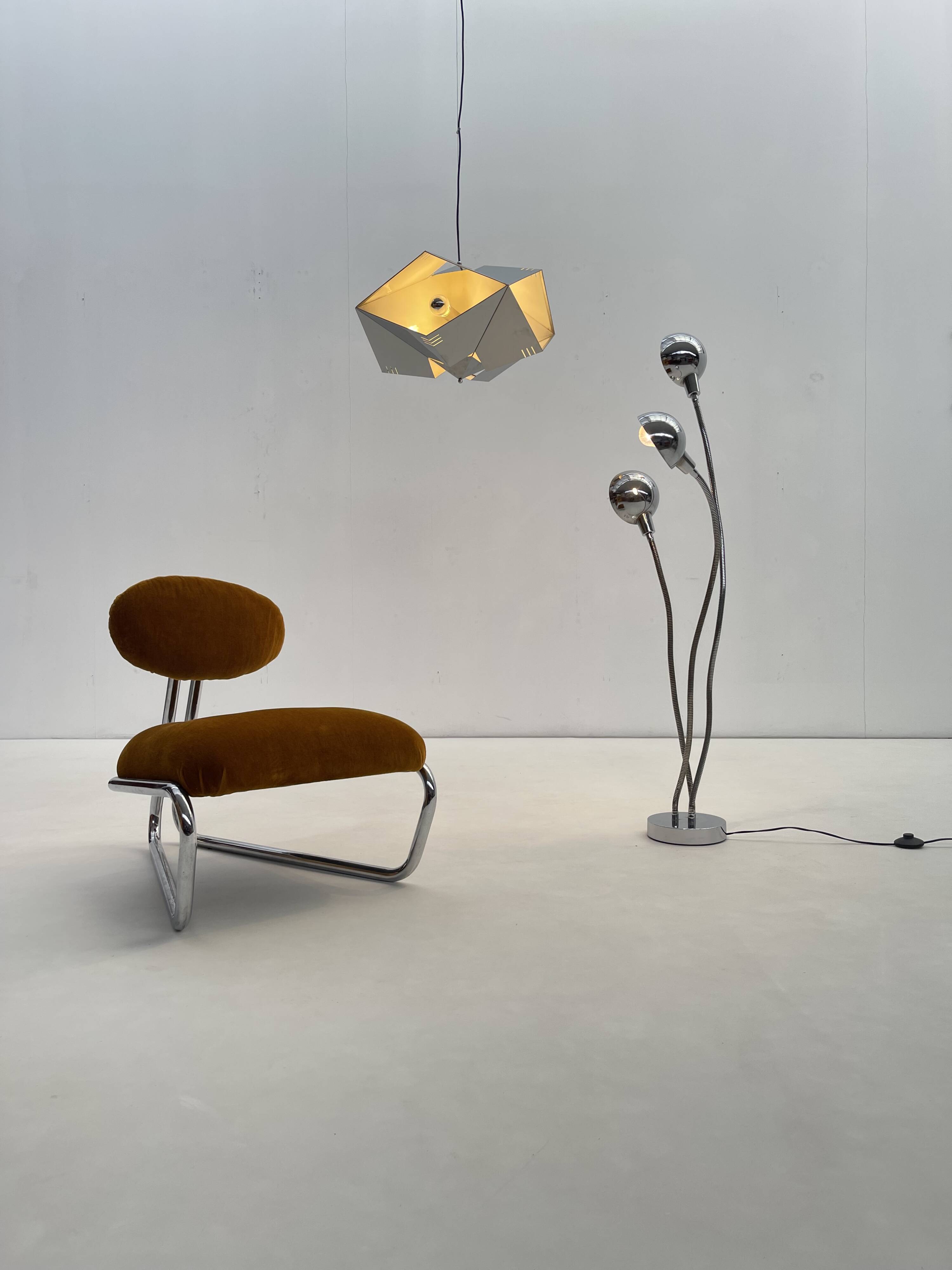 Little tubular lounge chair in rusty amber velvet