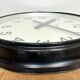 Black swiss industrial wall clock from inducta, 1960s