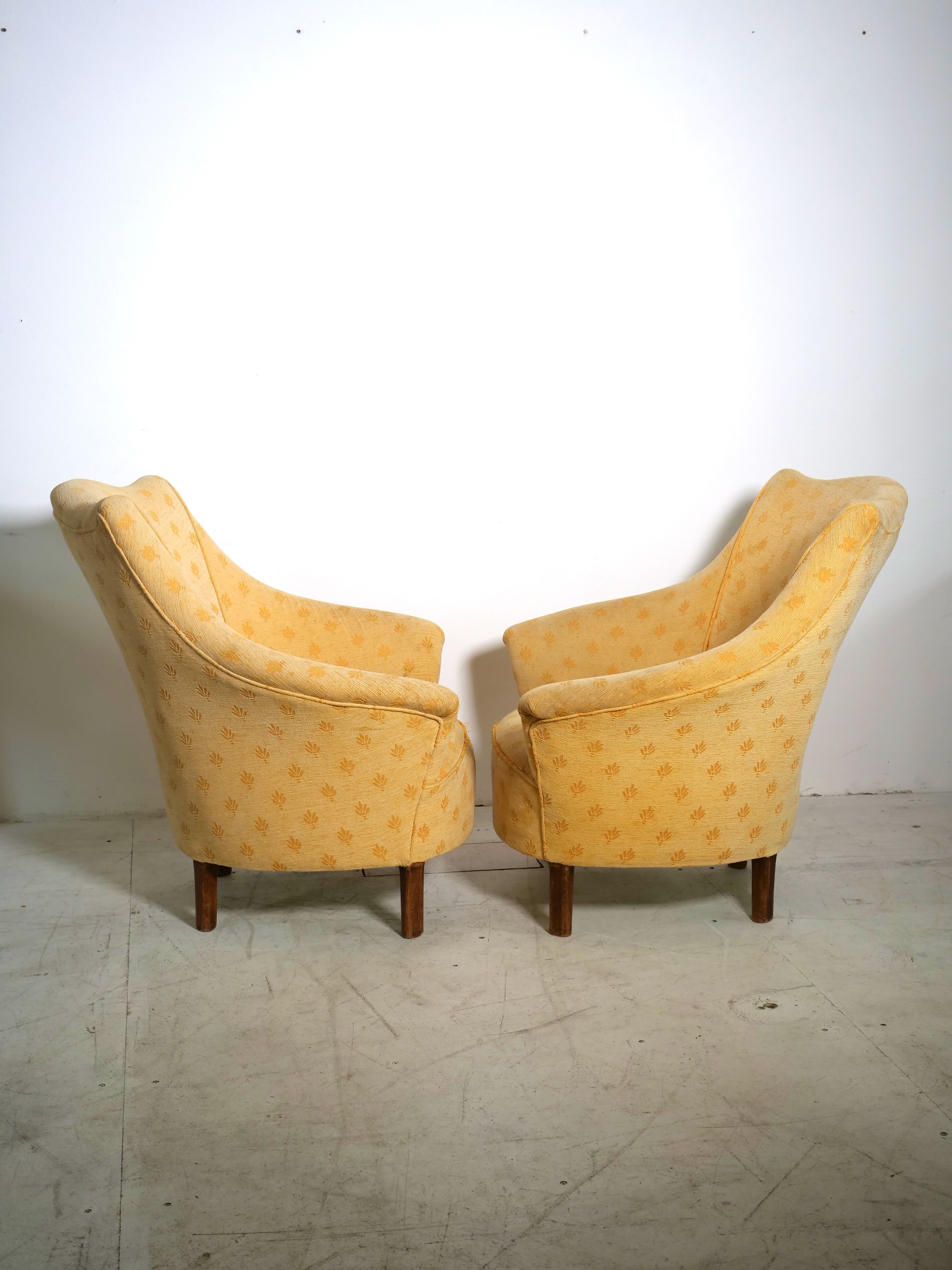 Pair of yellow vintage armchairs