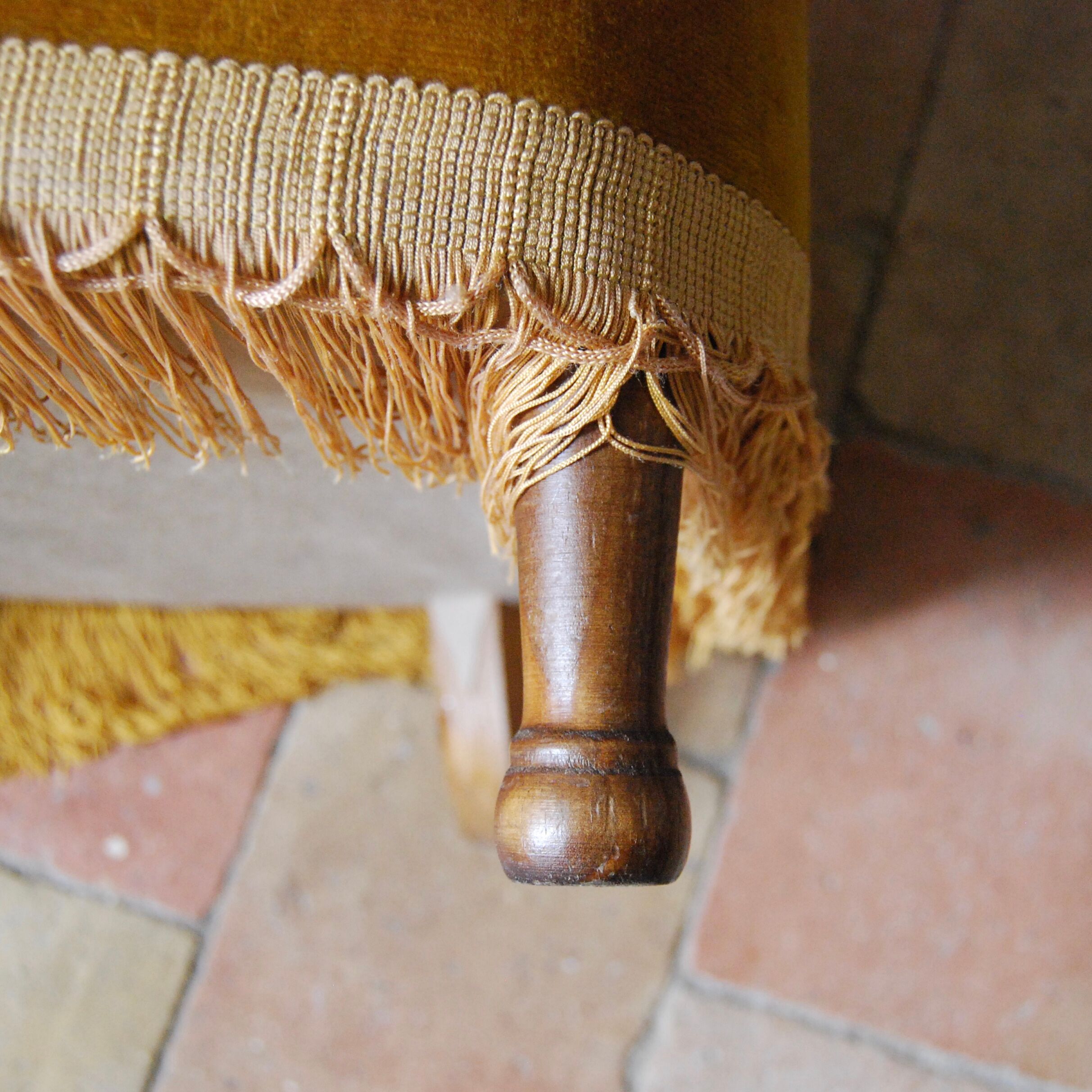 Toad in yellow velvet armchair