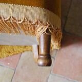 Toad in yellow velvet armchair