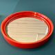 Round orange mirror Gilac for Prisunic
