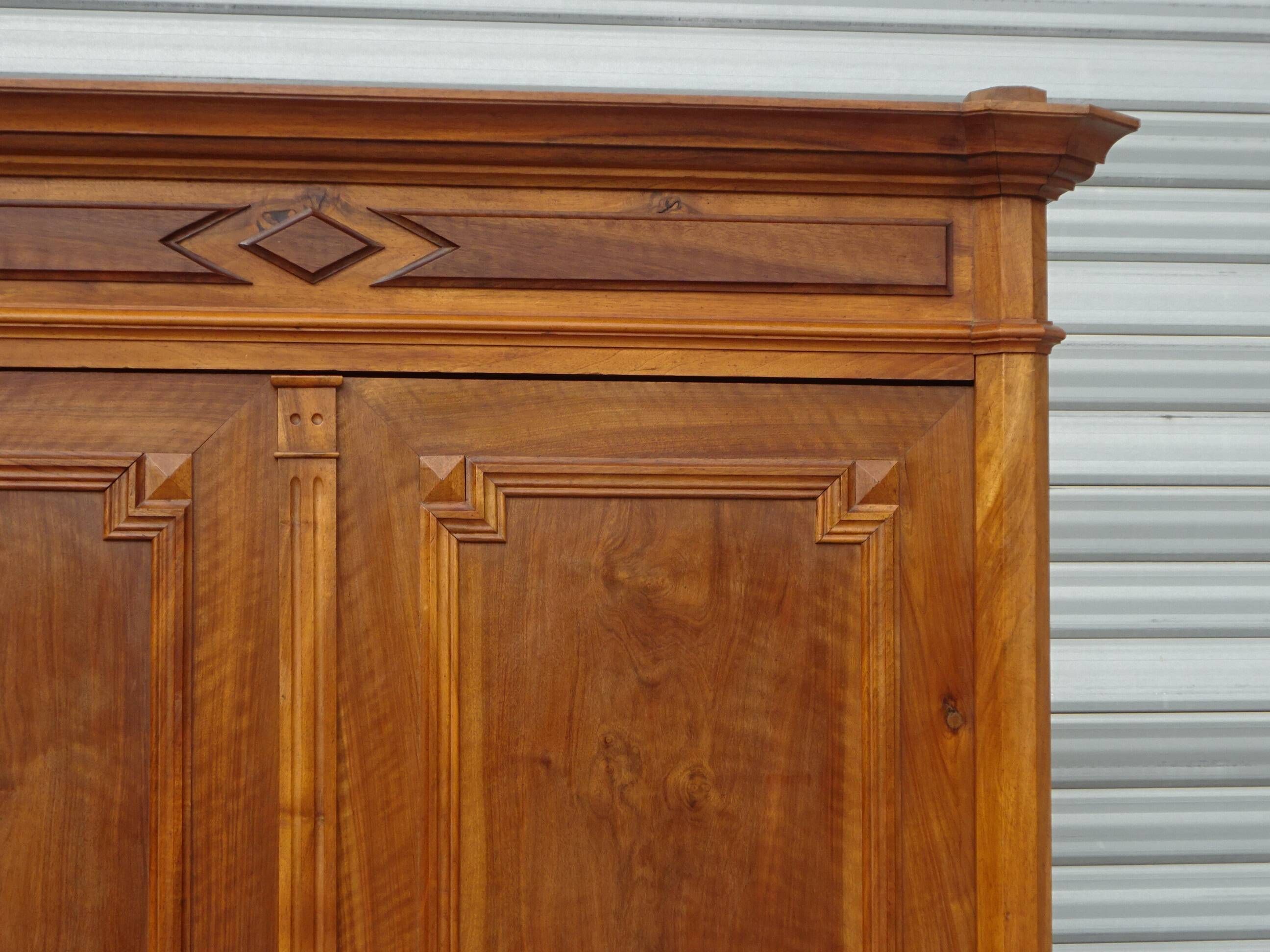 Large antique wardrobe in solid walnut