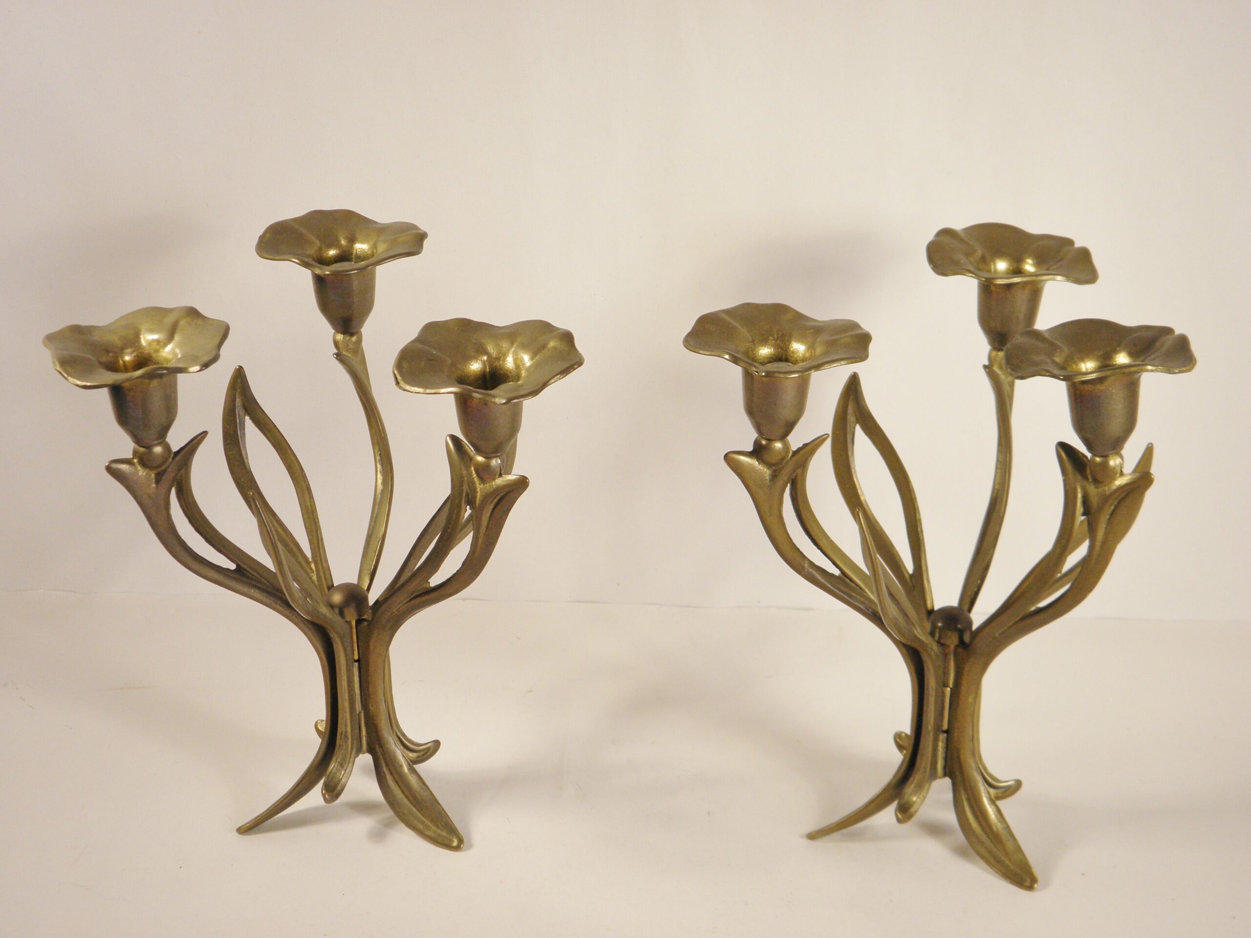 Pair of candlesticks three fires in brass
