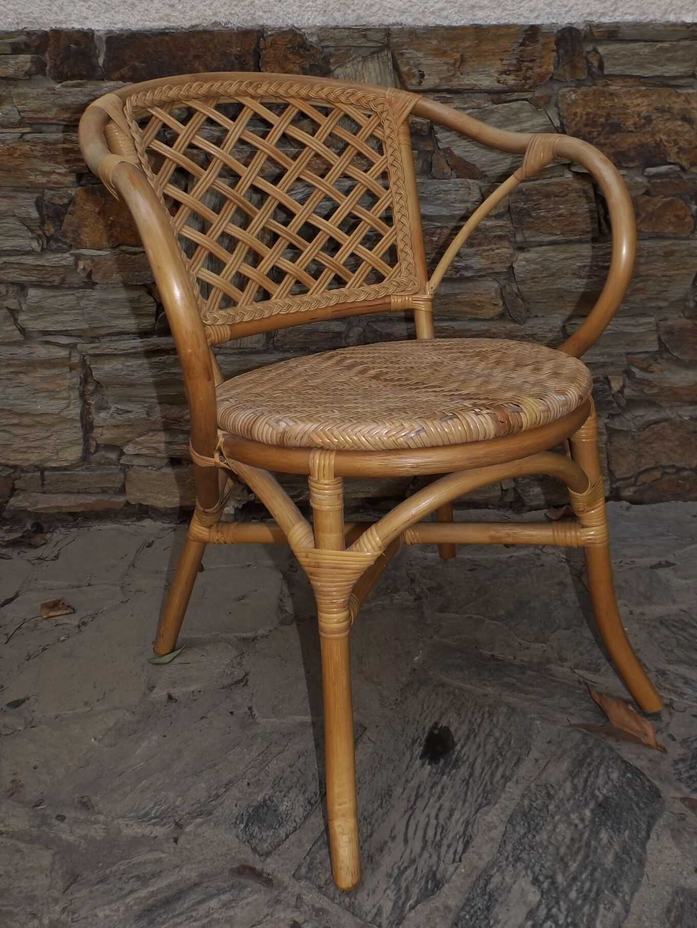 Armchair in rattan in Assisi year circa 1970