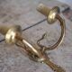Pair of Empire style bronze wall lights, bronze wall light with palmette and swan neck.