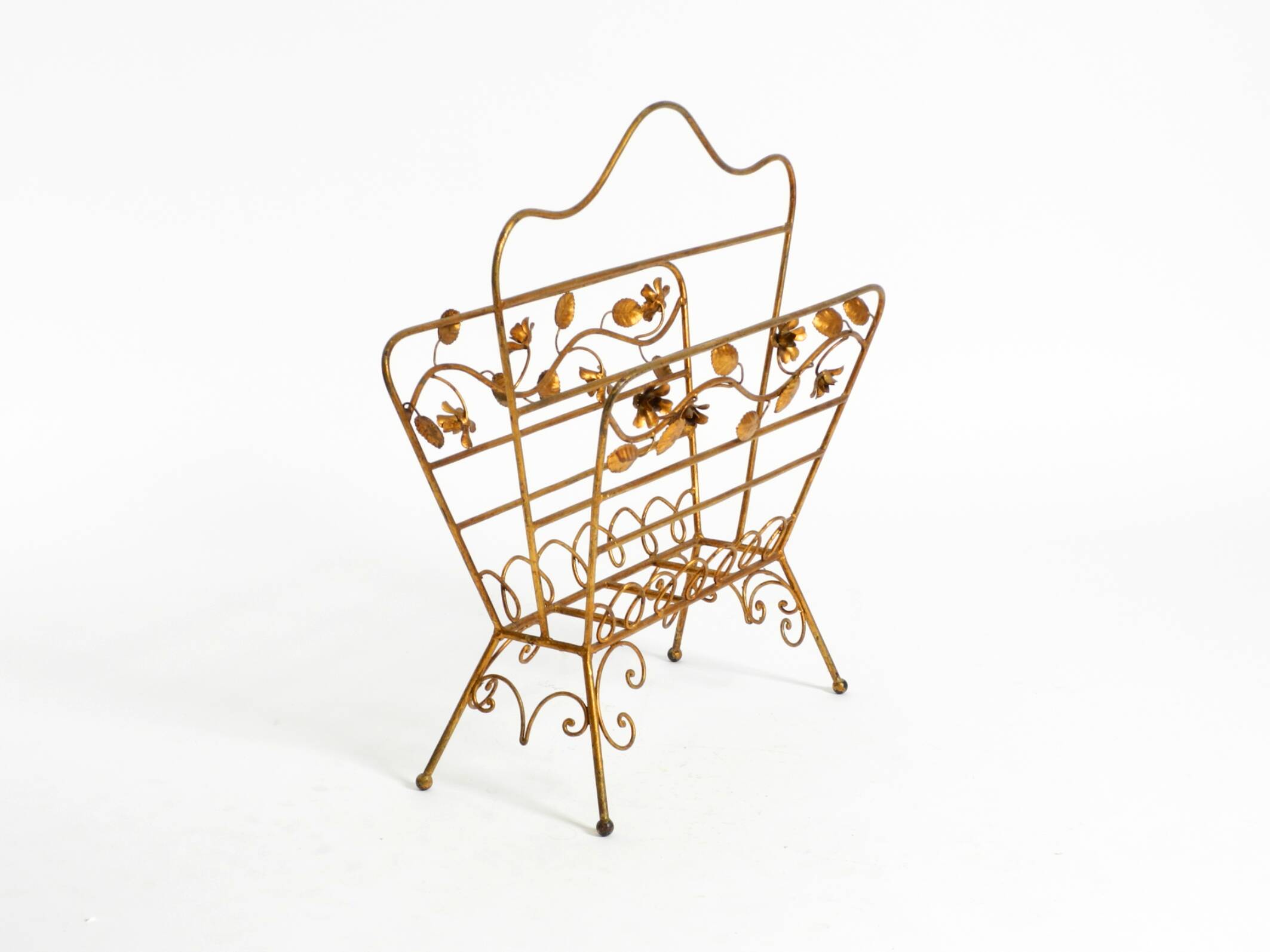 Extraordinary mid-century newspaper and magazine rack with a gilded metal