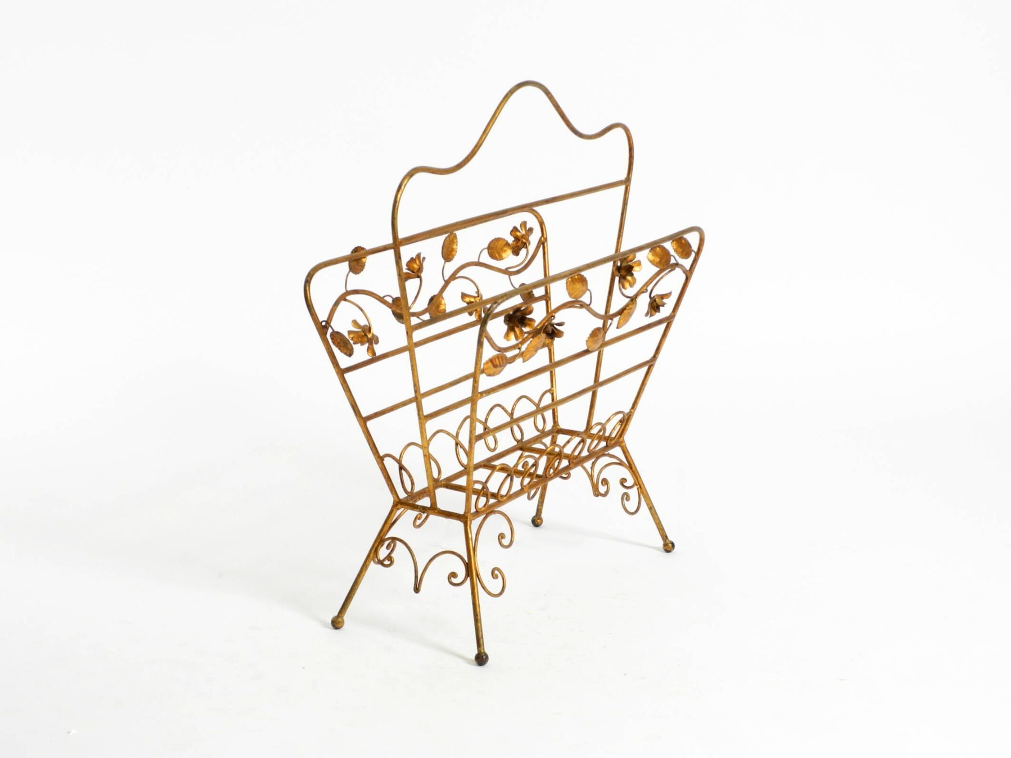 Extraordinary mid-century newspaper and magazine rack with a gilded metal