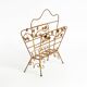 Extraordinary mid-century newspaper and magazine rack with a gilded metal