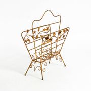 Extraordinary mid-century newspaper and magazine rack with a gilded metal
