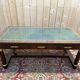 Bureau plat de style Empire en acajou et cuir vert
