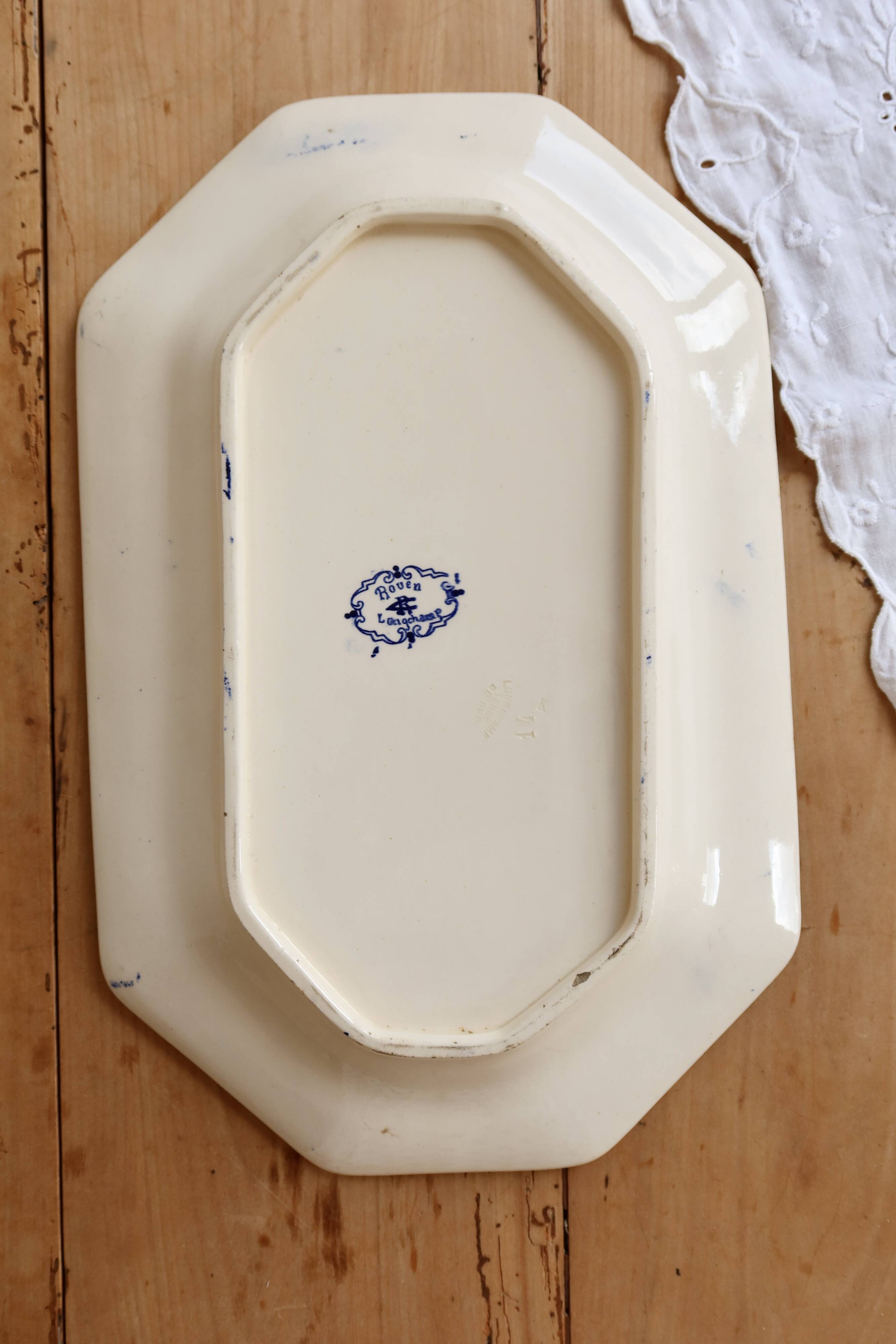 Plat de service ovale terre de fer Longchamp Rouen XIXe