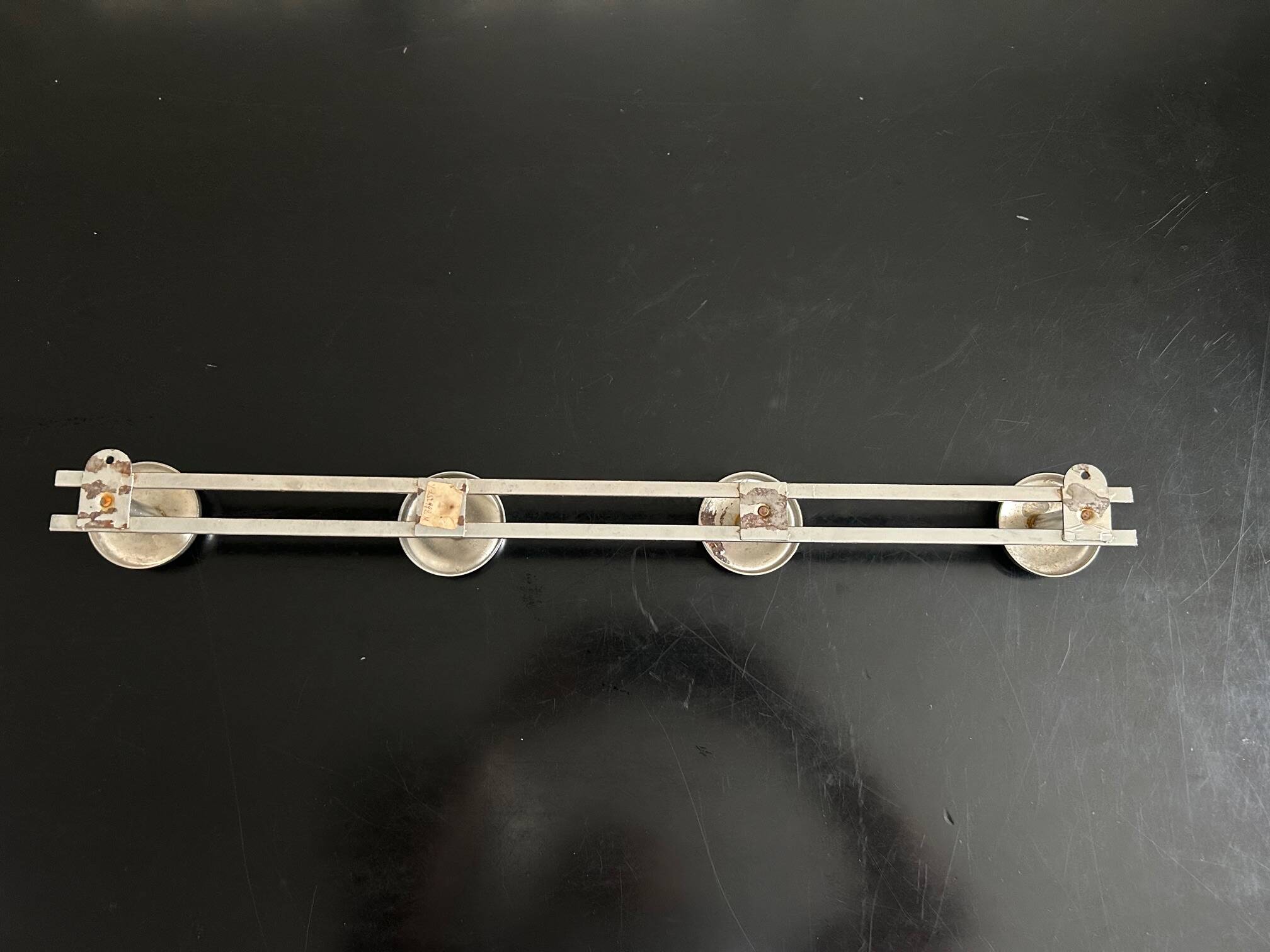 old chrome metal coat rack