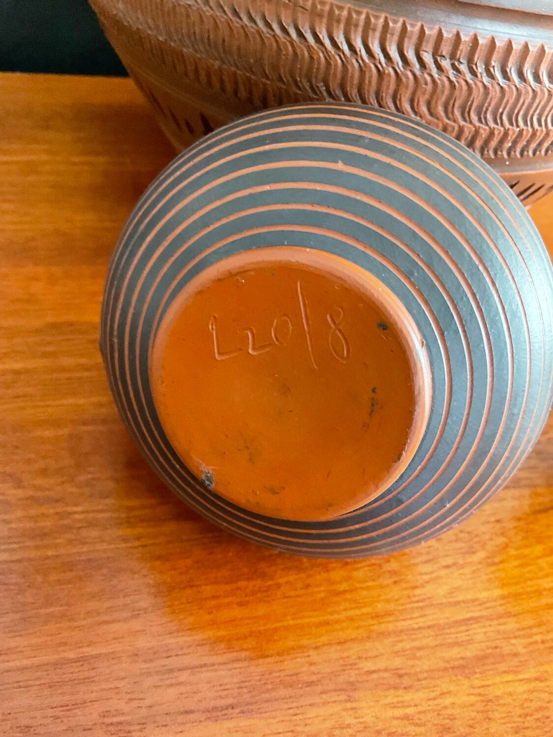 Trio of vintage vases in chiselled terracotta