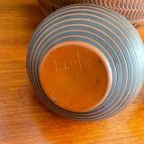 Trio of vintage vases in chiselled terracotta