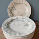 Set of 12 flat plates Terre De Fer XIXth in opaque porcelain of Gien, model Rinceaux