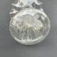 Vintage transparent glass vase in flower shape.