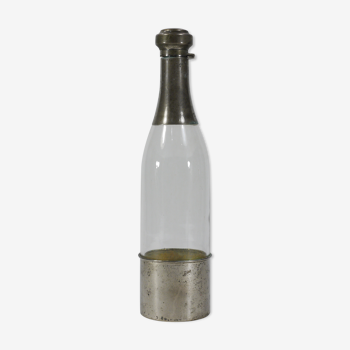 Bottle in glass and metal