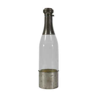 Bottle in glass and metal