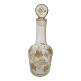 Old crystal carafe with golden decoration