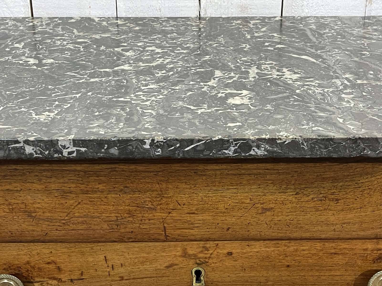 19th-century Empire commode in walnut with a grey St Anne marble top.