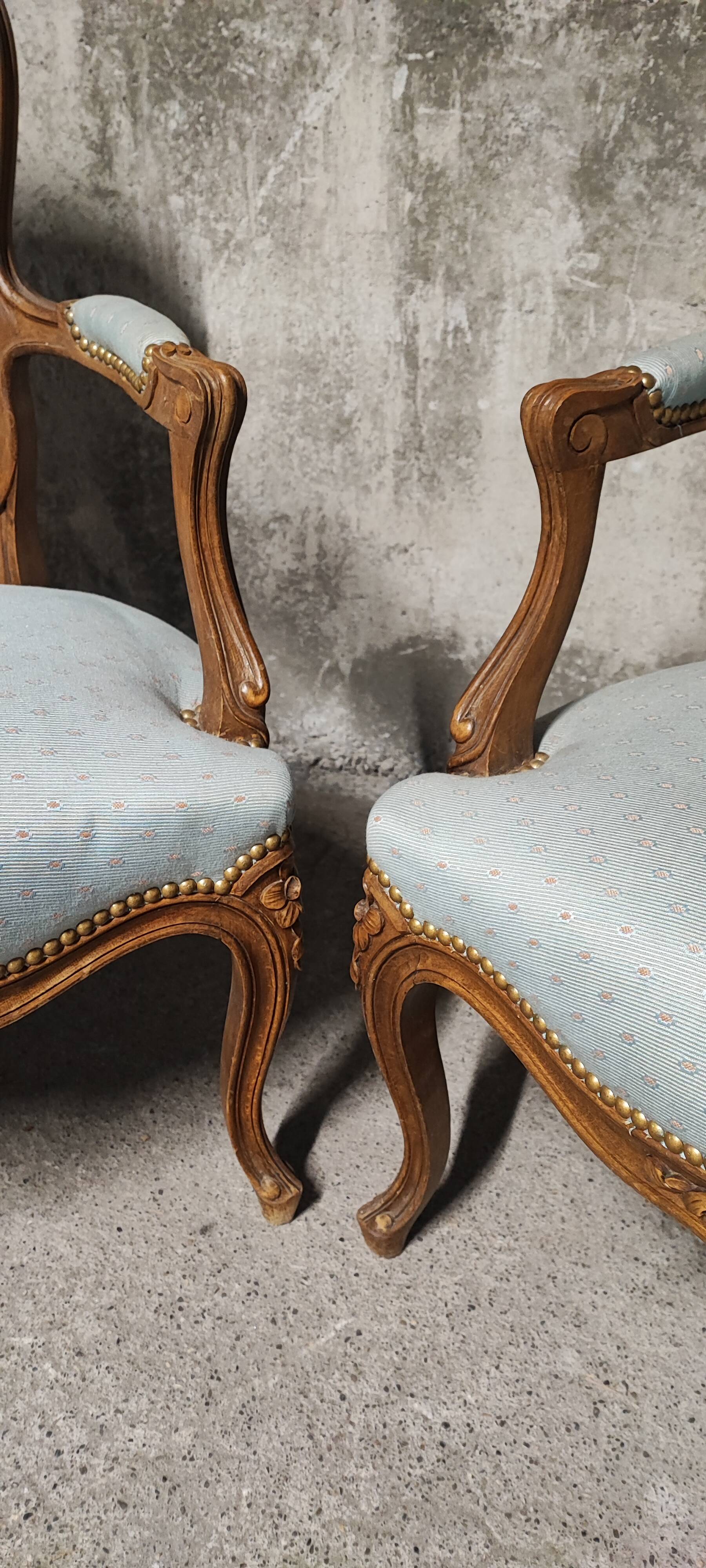 Reupholstered Louis XV convertible armchairs