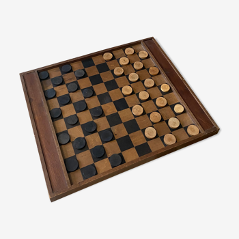 Old ladies game and vintage chess board