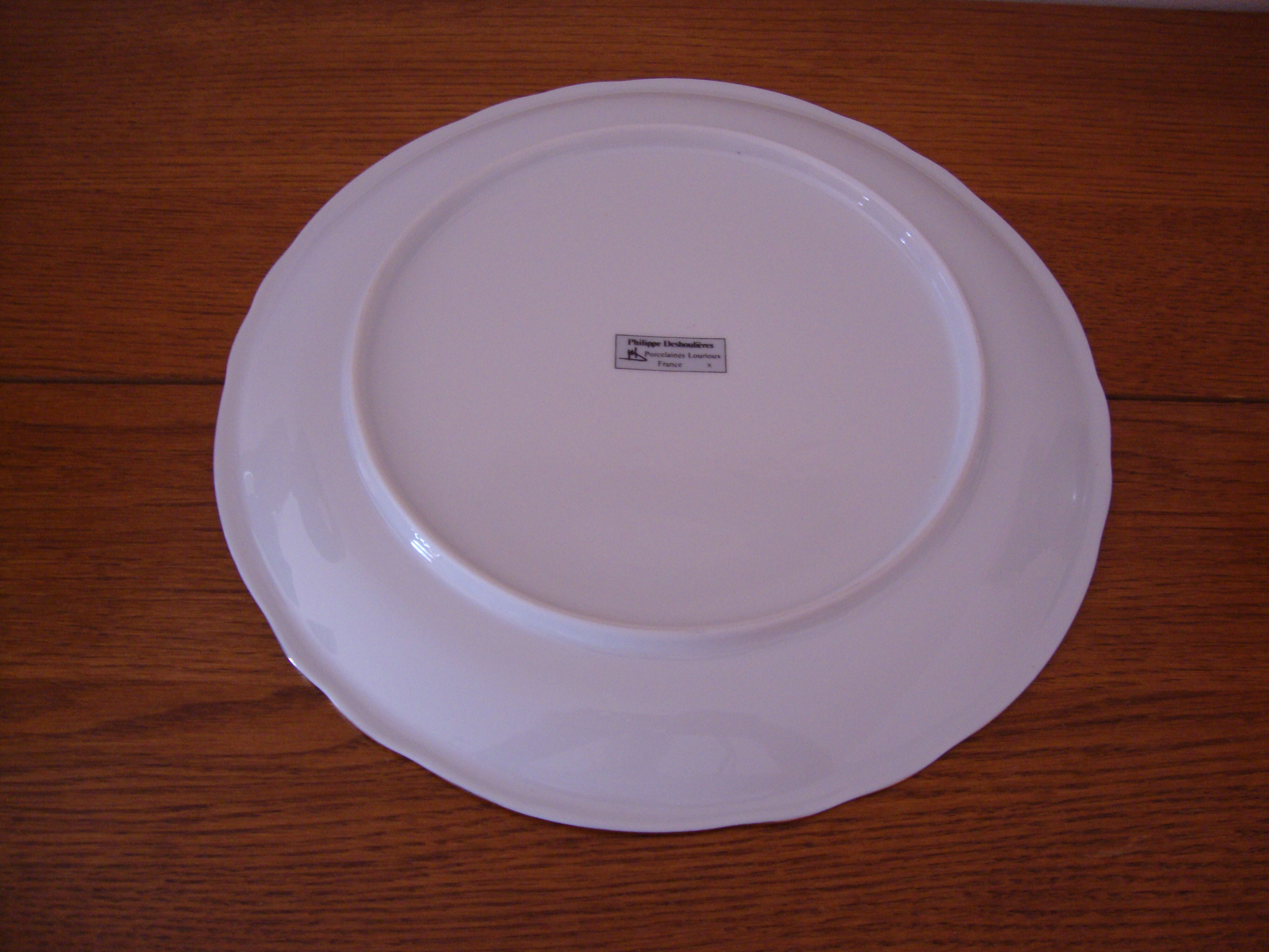 Fine white porcelain cake dish (creation A. Deshoulières)