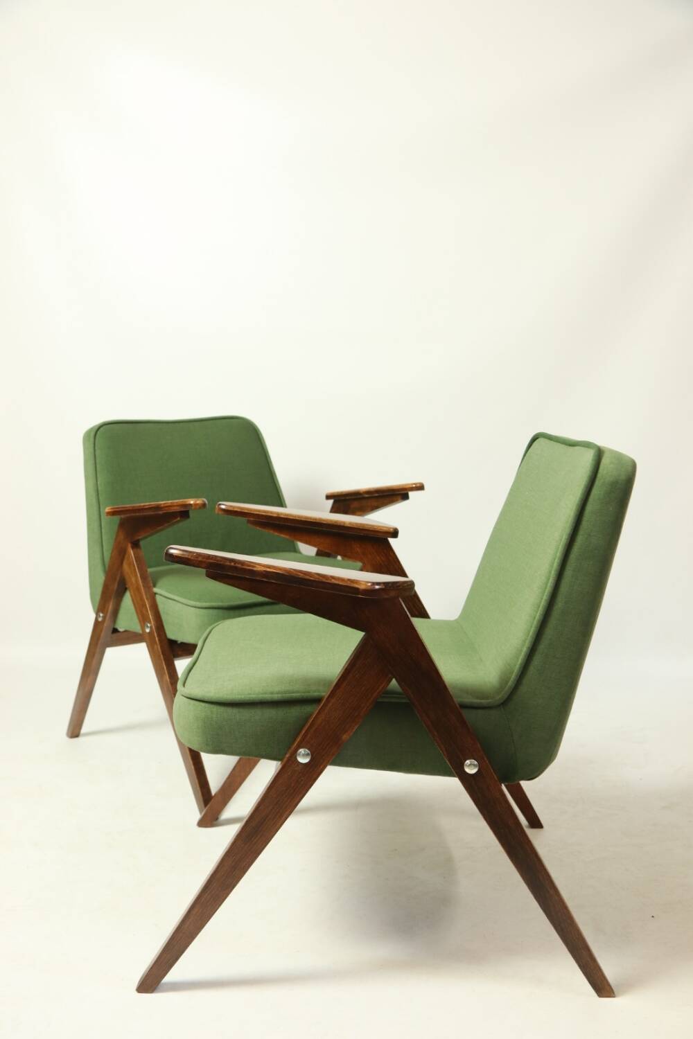 Pair of royal green velvet armchairs