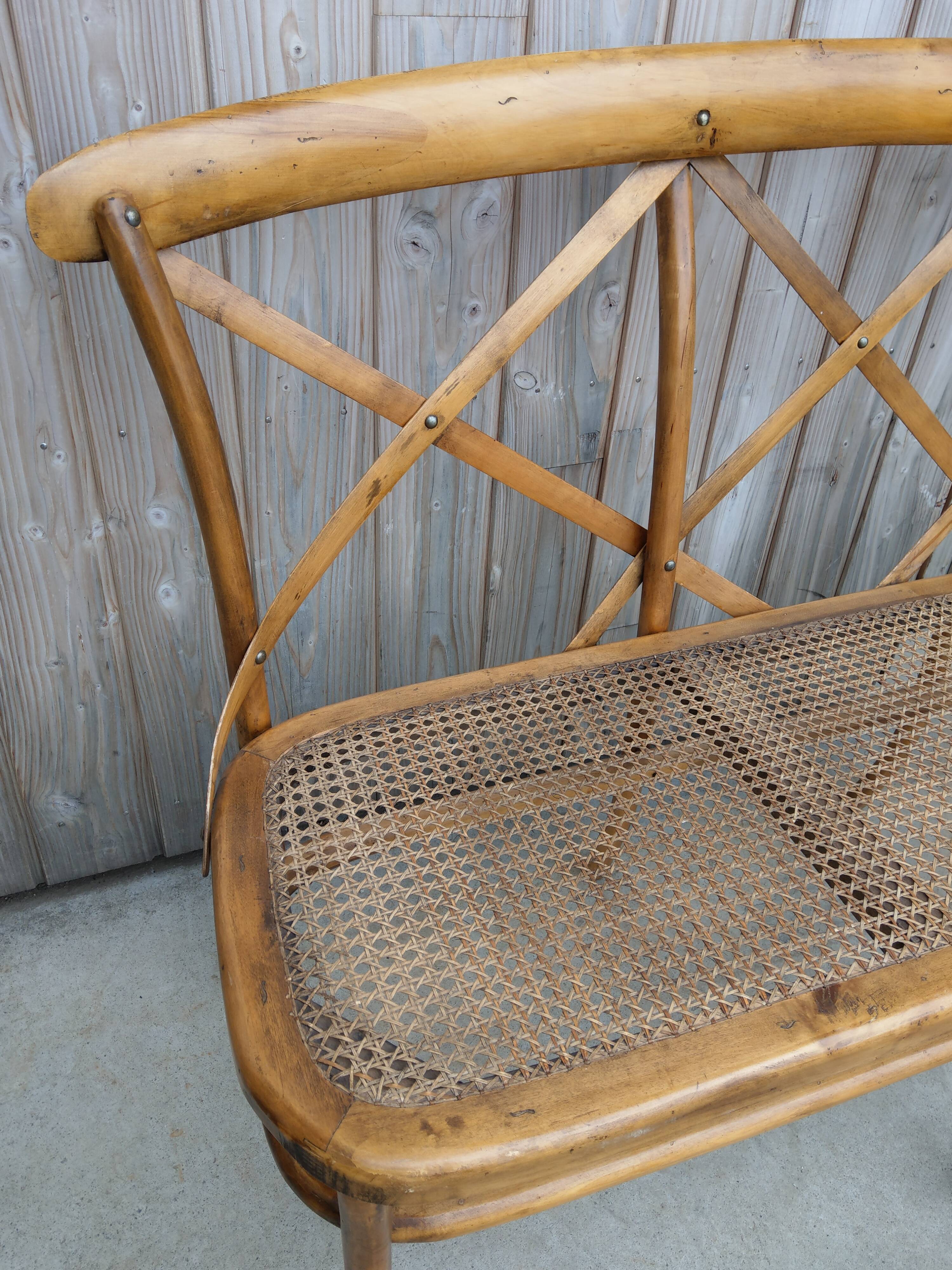 Former bench in wood and caning