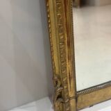 Miroir ancien de style Louis XVI, doré à la feuille