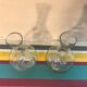 Paire de carafes rafraîchissoirs en verre