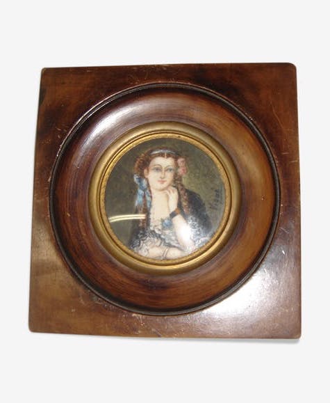Miniature portrait of woman signed Vigué
