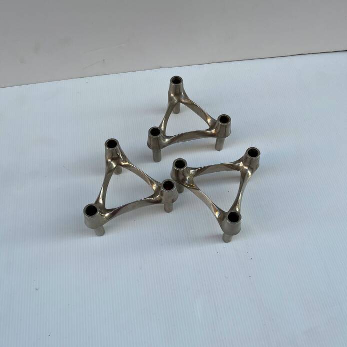 Vintage Stoffnagel candle holders in chrome steel