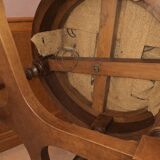 Antique swivel armchair in carved wood and patinated leather – neo-Renaissance style