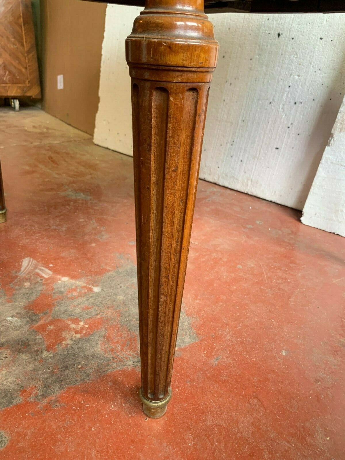 Louis XVI style table in mahogany and light wood 20th century