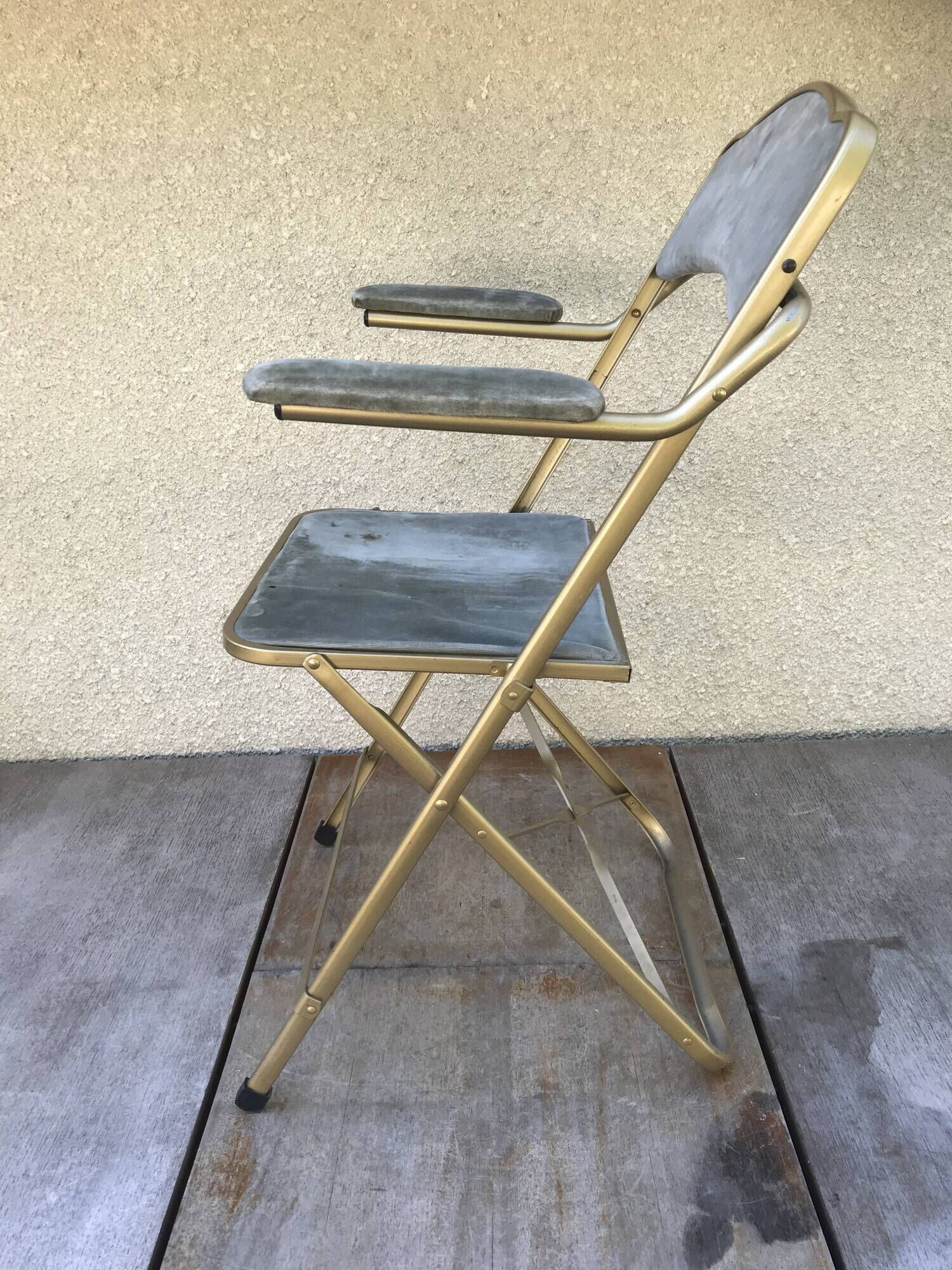 Former Lafuma gold metal folding chair