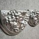 Pair of Art Deco style wall sconces in silvered plaster