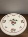 Plat en faïence de Longwy à décor de cerises