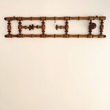 Vintage wooden wall coat rack with 4 swivel hooks from 1920