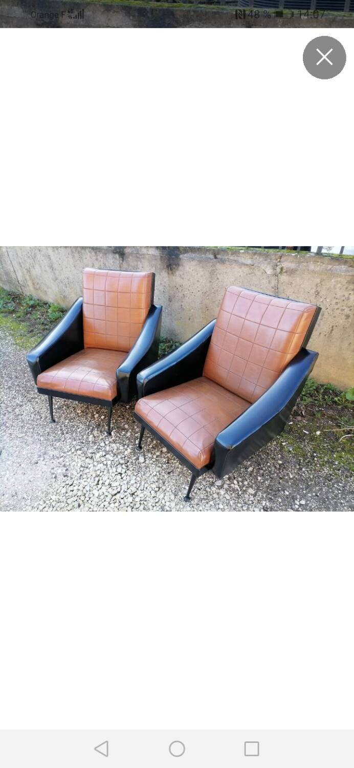 Pair of faux leather armchairs