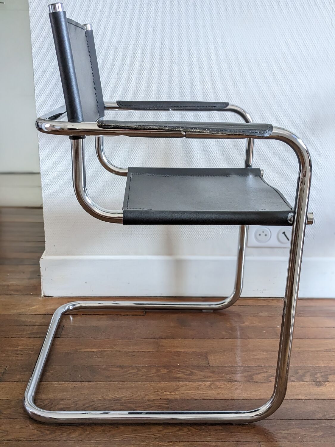 Vintage designer leather and metal armchair