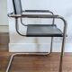 Vintage designer leather and metal armchair