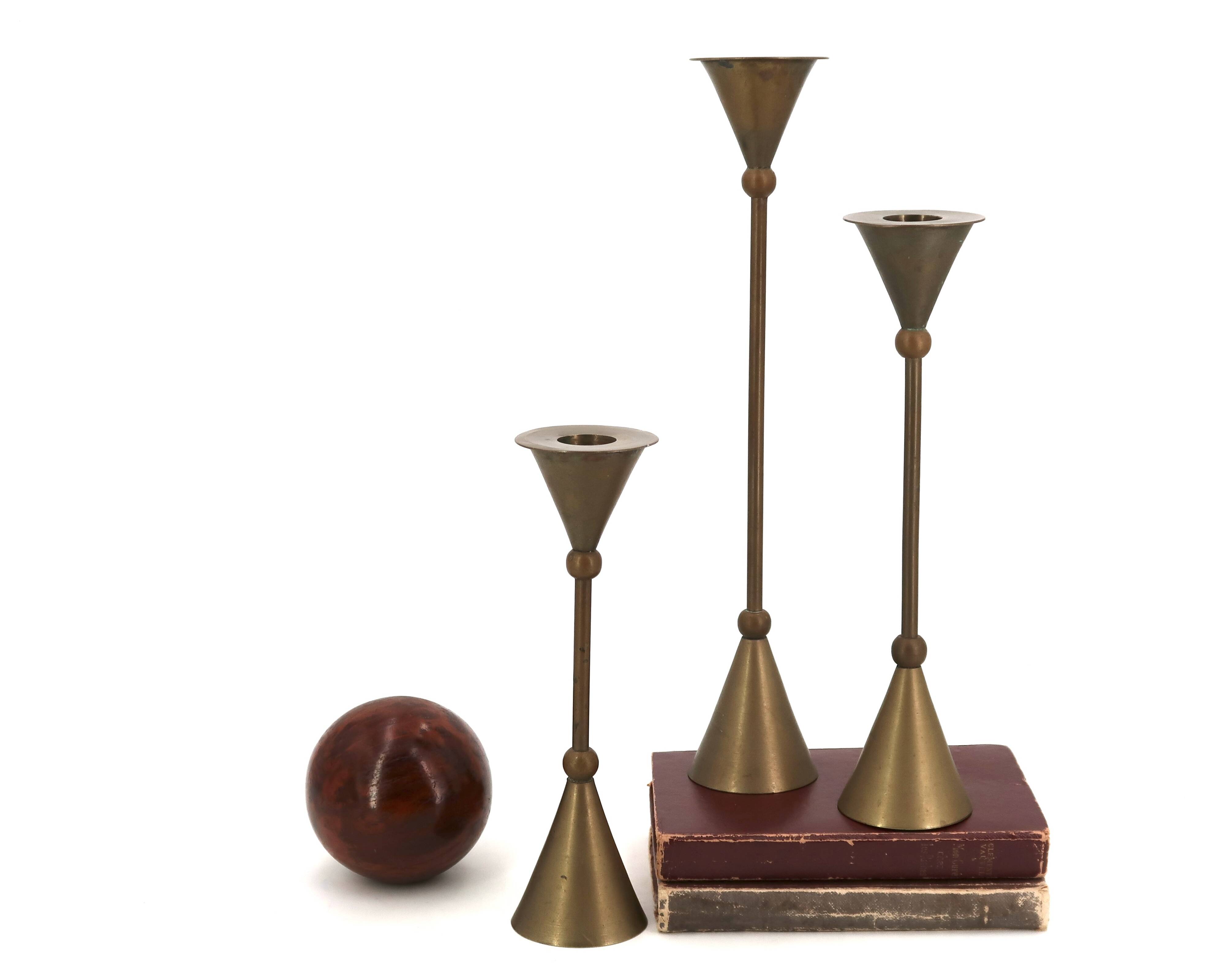 Brass candle holder trio by Christian de Beaumont, 1970s.