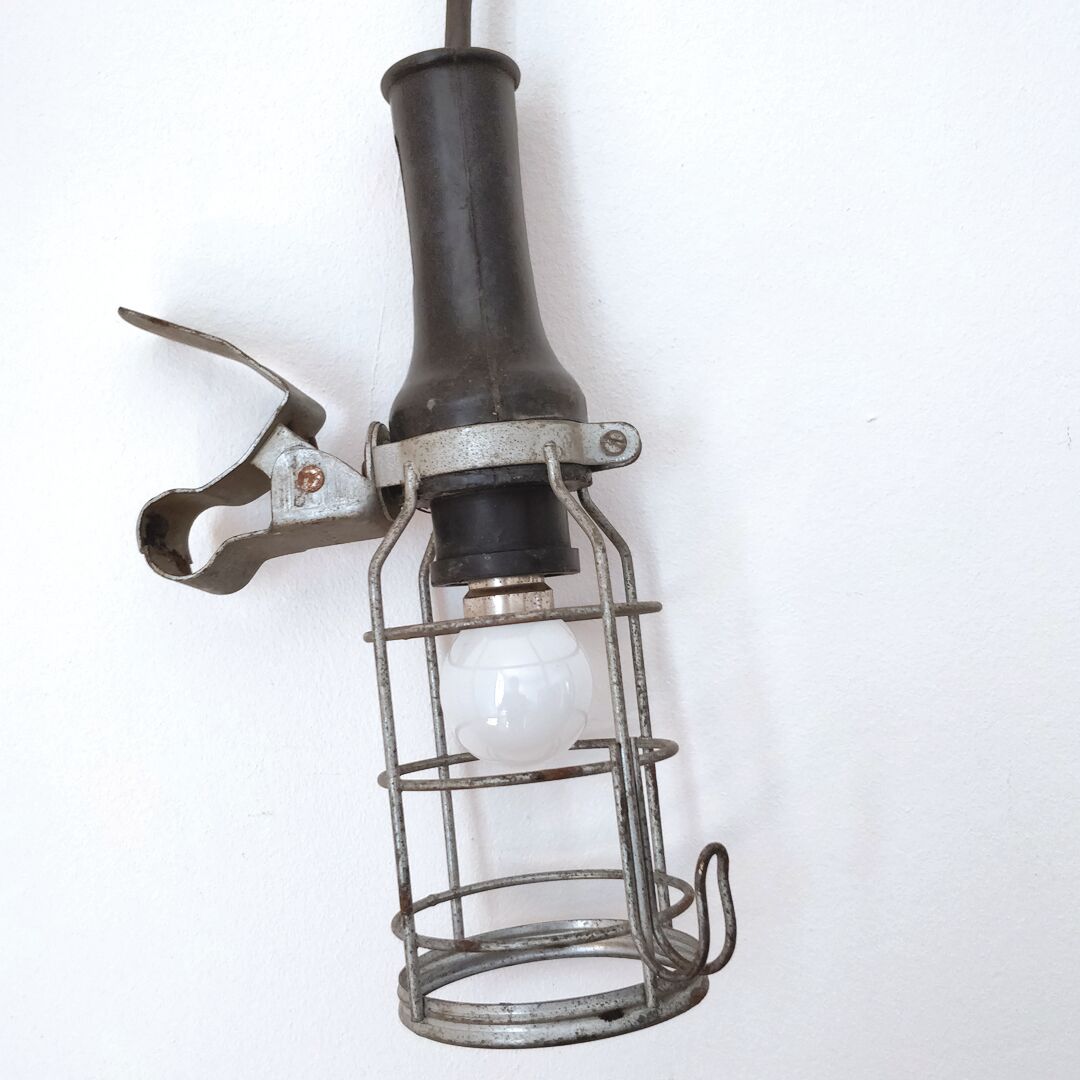 Black industrial atrow walking lamp