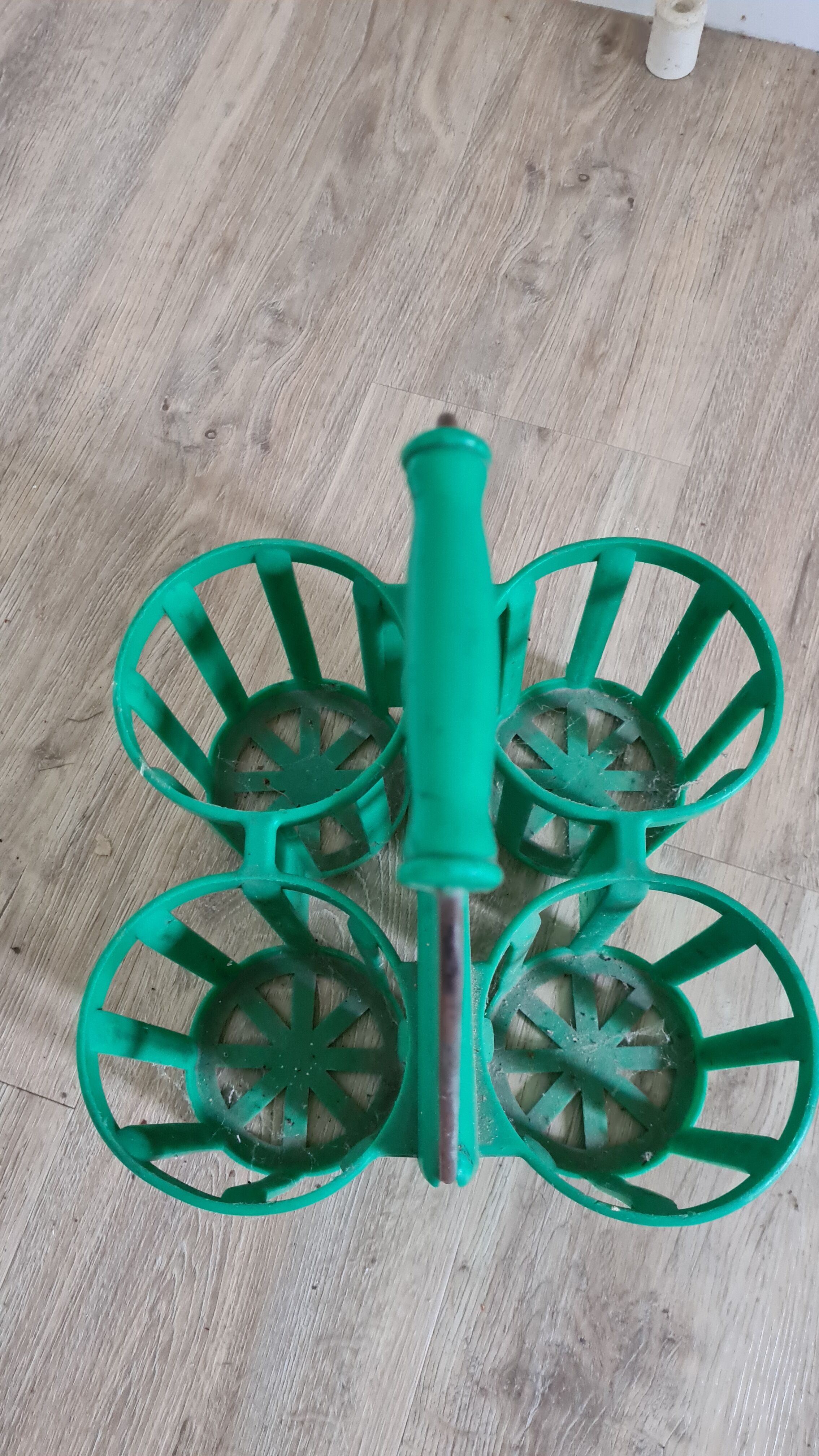 Green pola plastic bottle holder / 1970