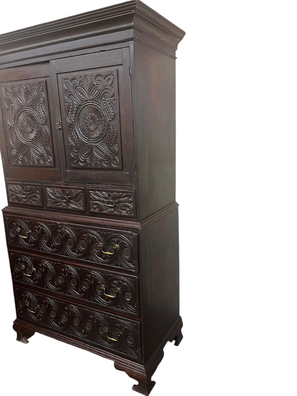 Antique tall wardrobe in dark carved wood / bohemian wardrobe
