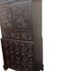 Antique tall wardrobe in dark carved wood / bohemian wardrobe